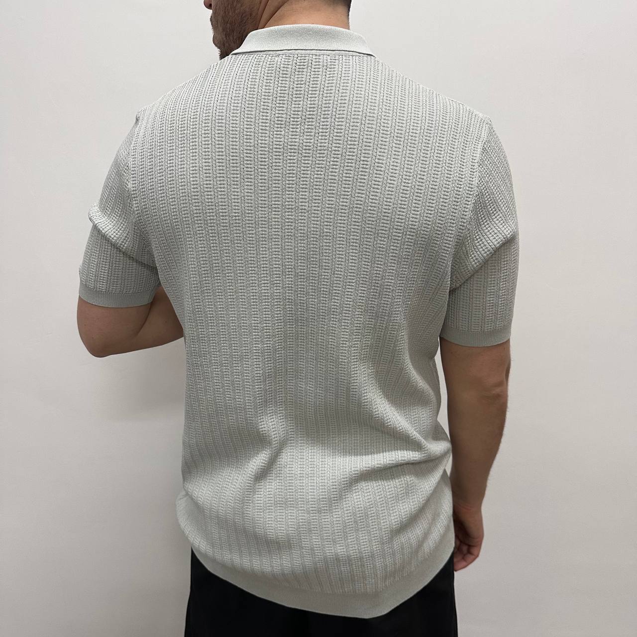 Polo con bottoni ghiaccio
