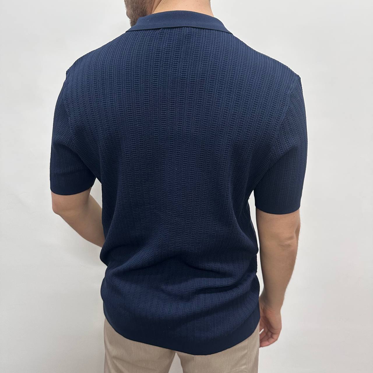 Polo con bottoni blu