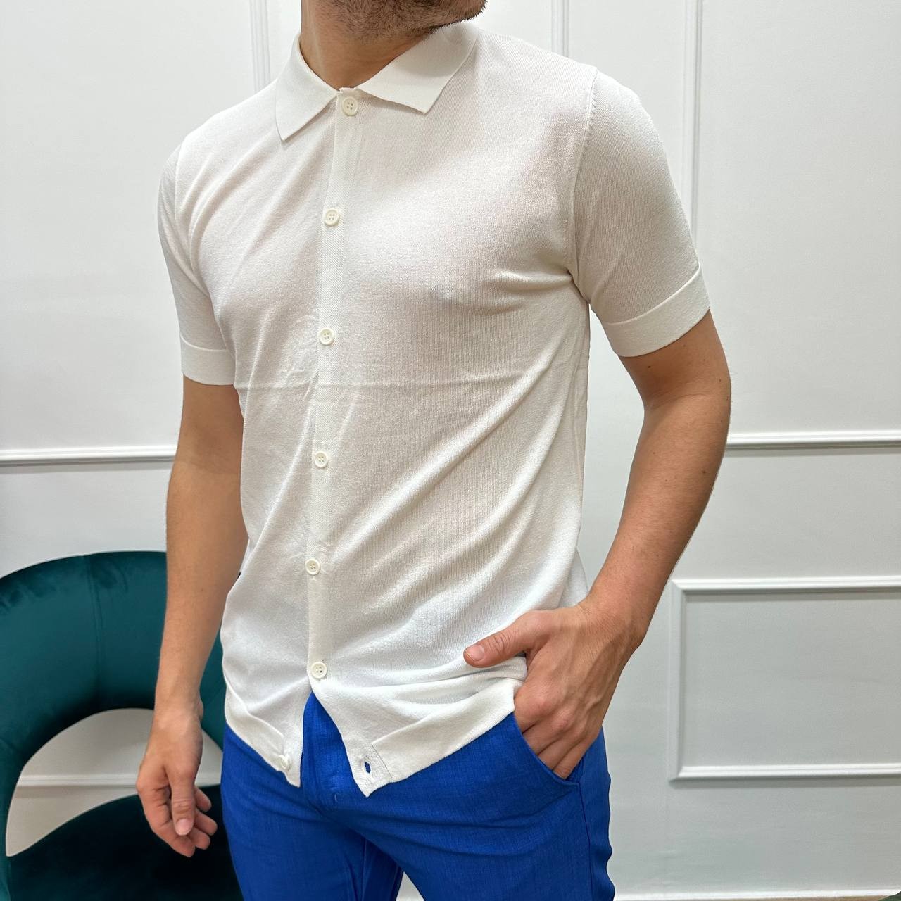 Polo con bottoni in filo bianca