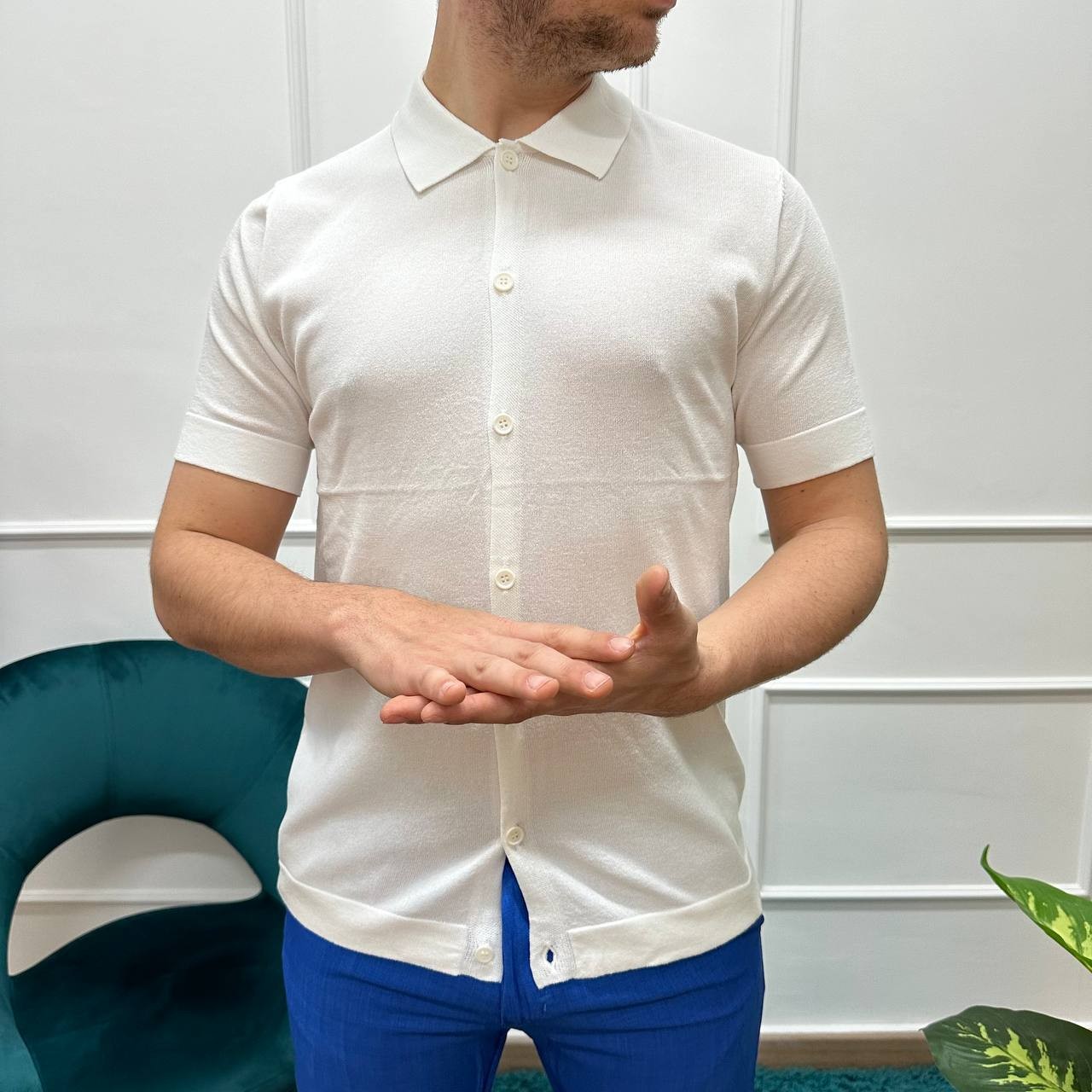 Polo con bottoni in filo bianca