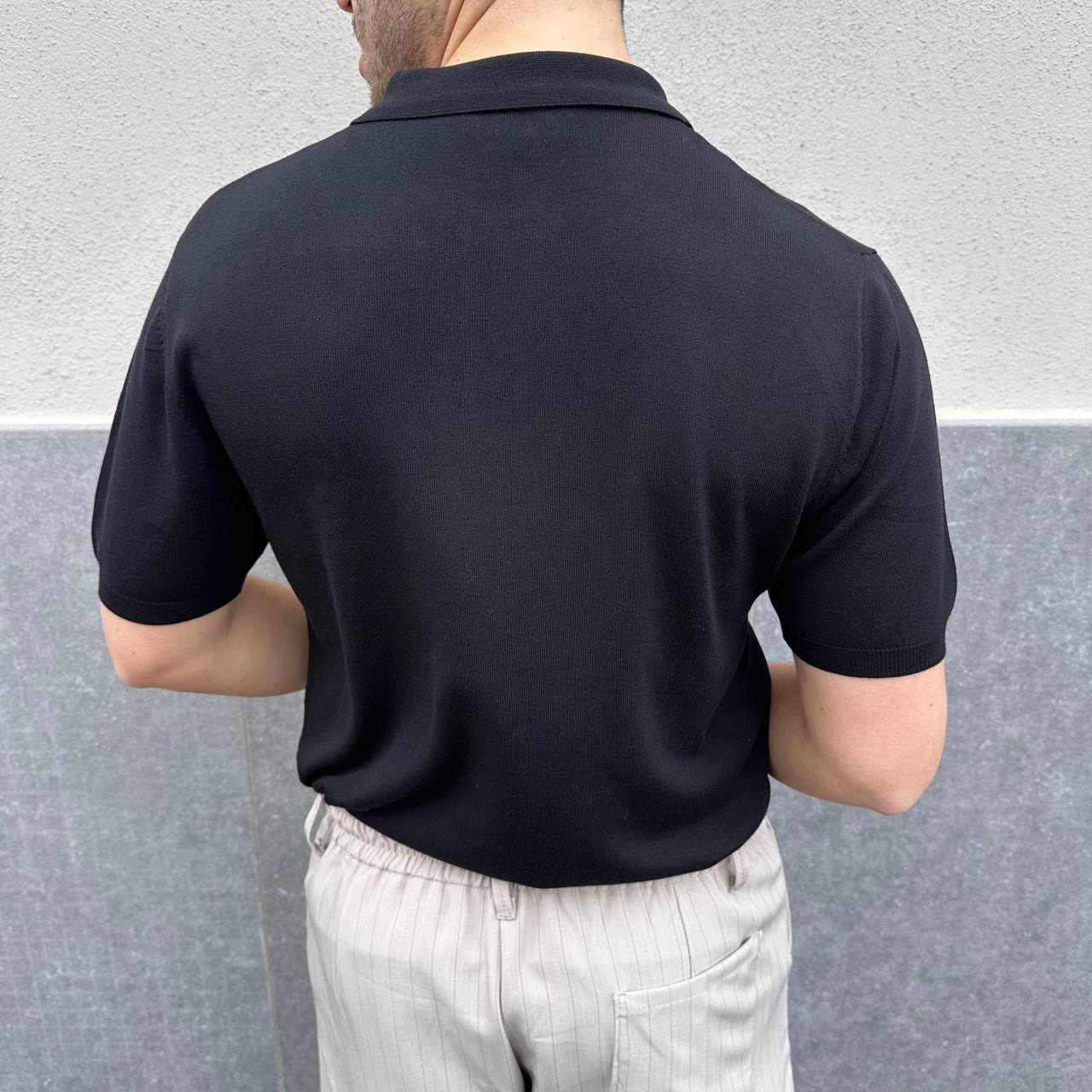 Polo in filo mezza zip nera