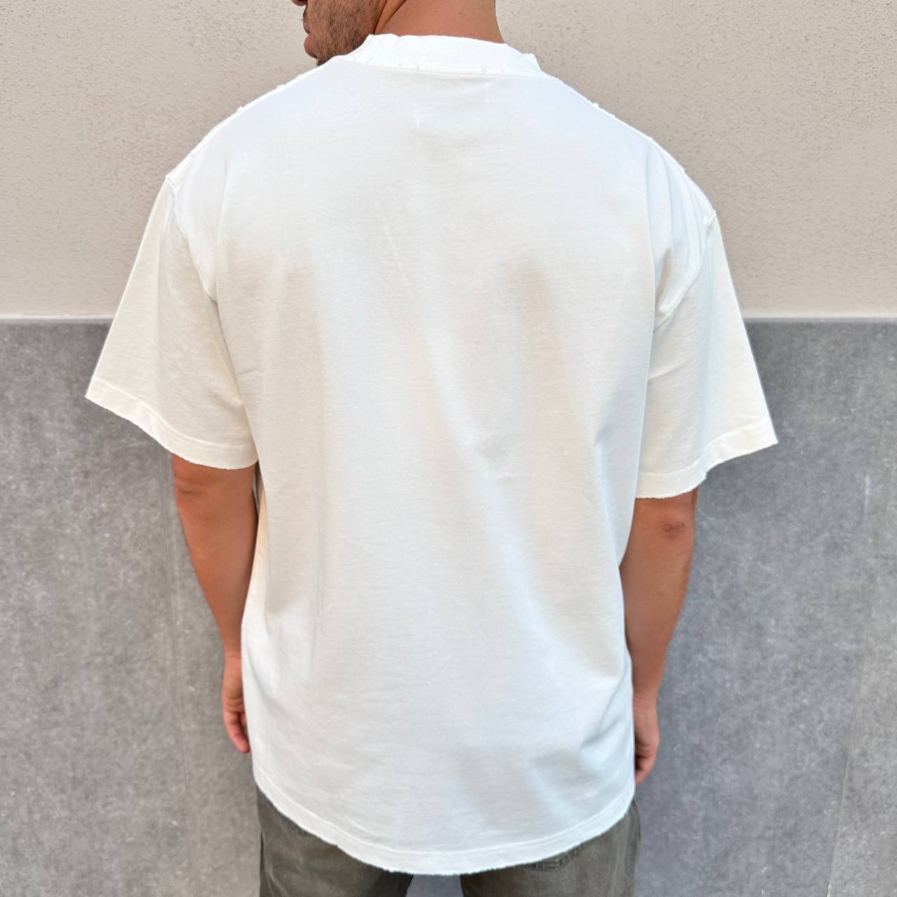 Shirt sfrangiata bianca