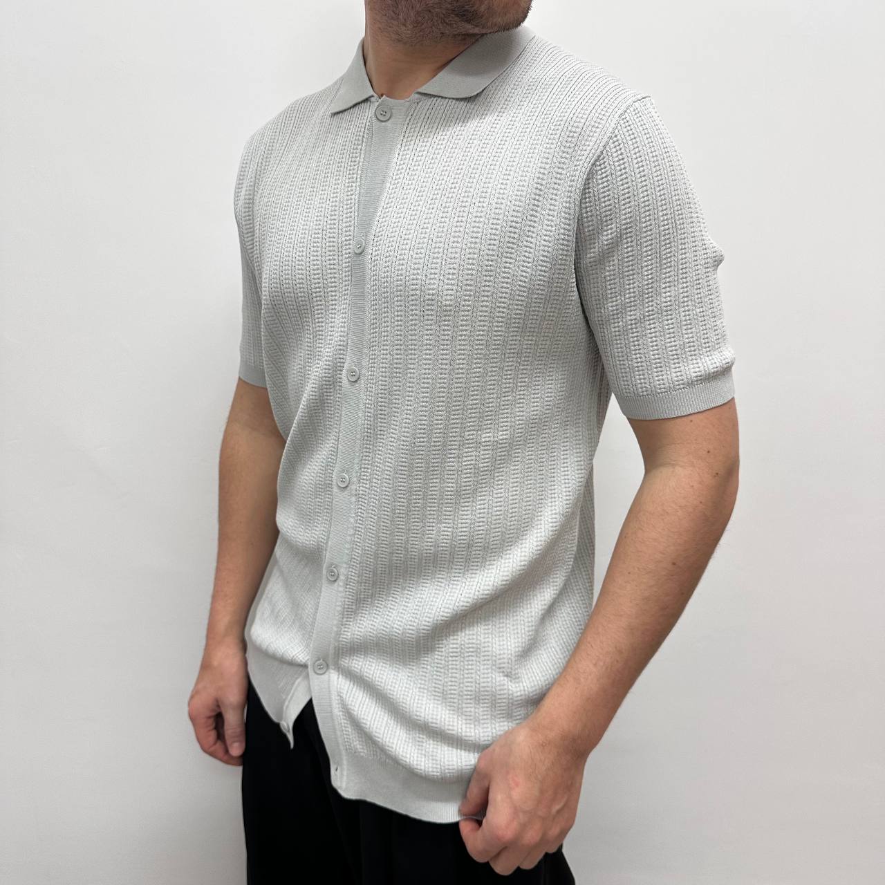 Polo con bottoni ghiaccio