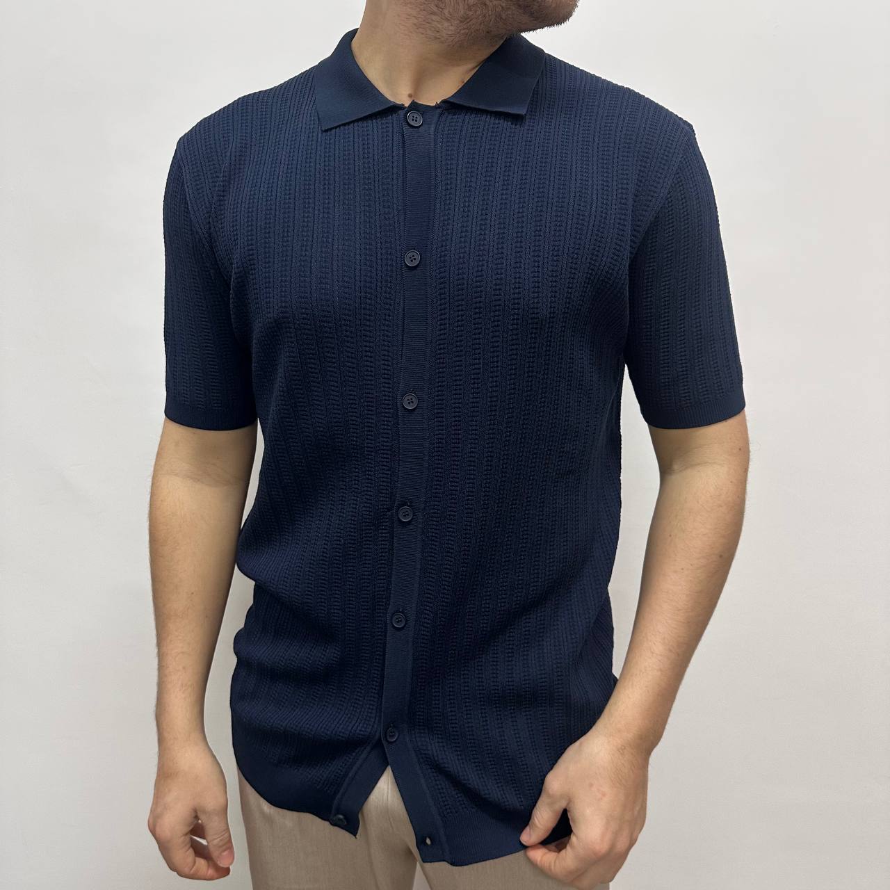 Polo con bottoni blu