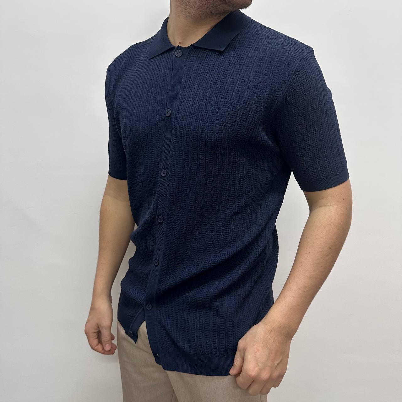 Polo con bottoni blu