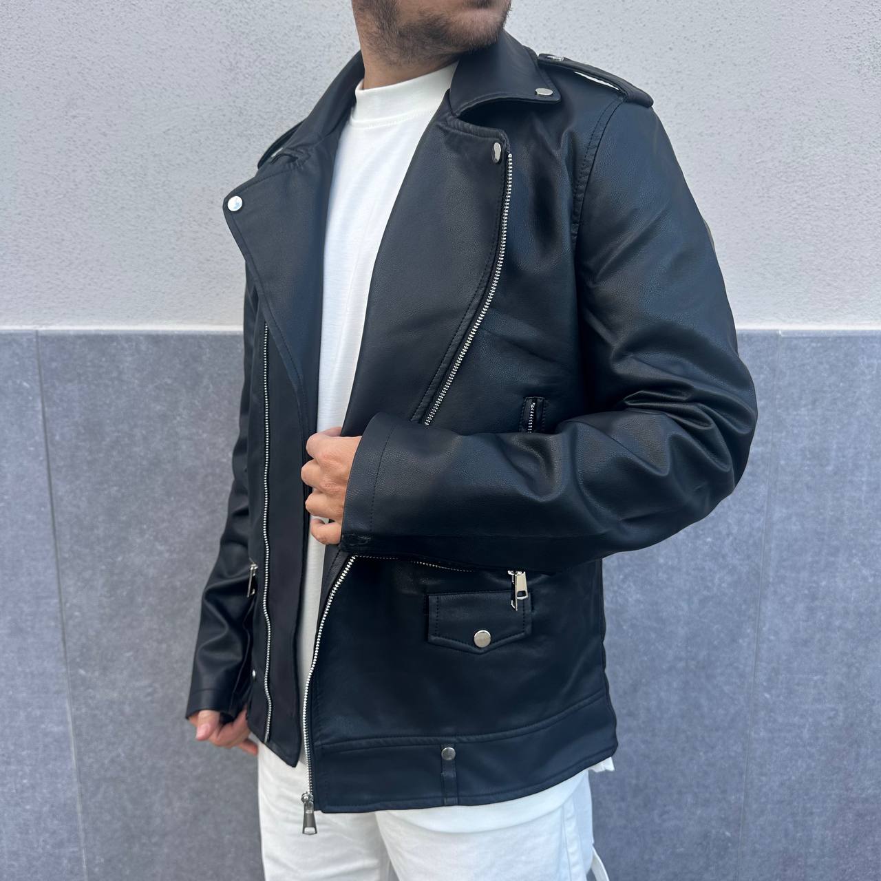 Chiodo in ecopelle nero