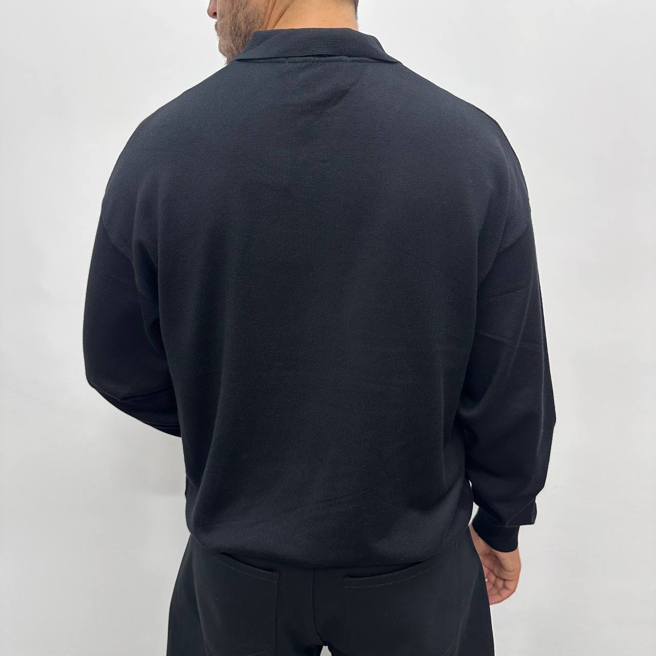 Polo over con zip nera