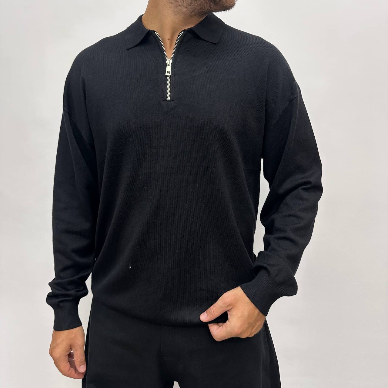 Polo over con zip nera