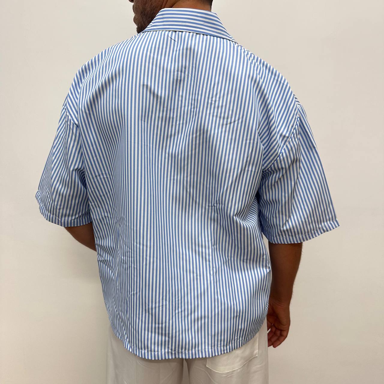 Camicia riga celeste