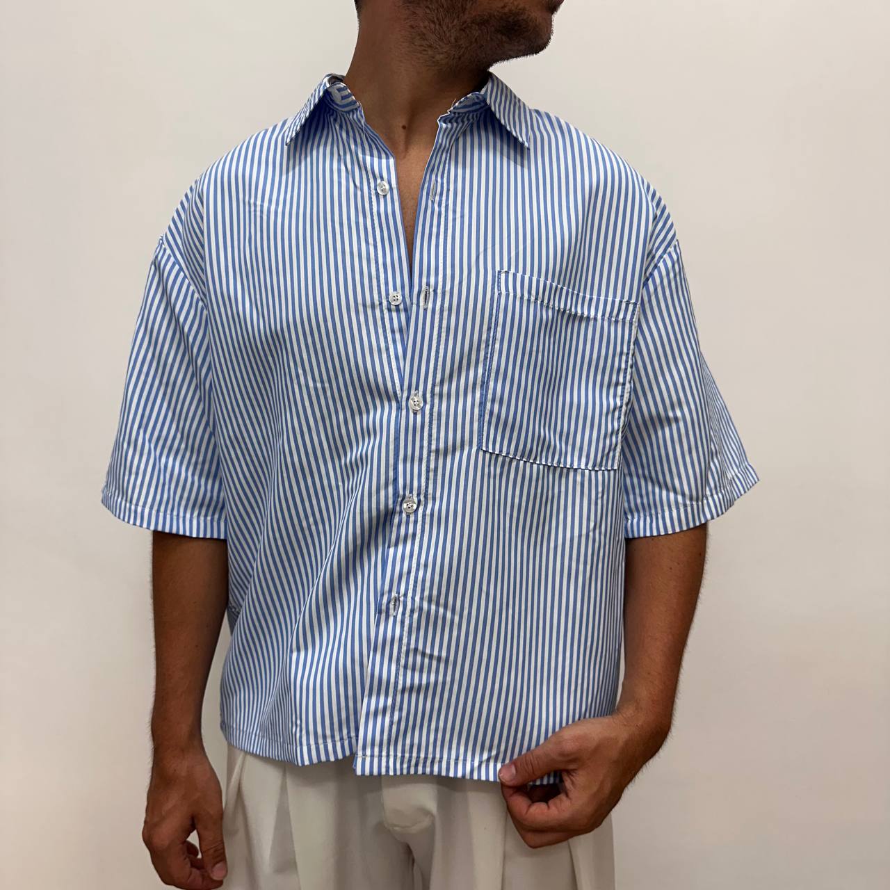 Camicia riga celeste